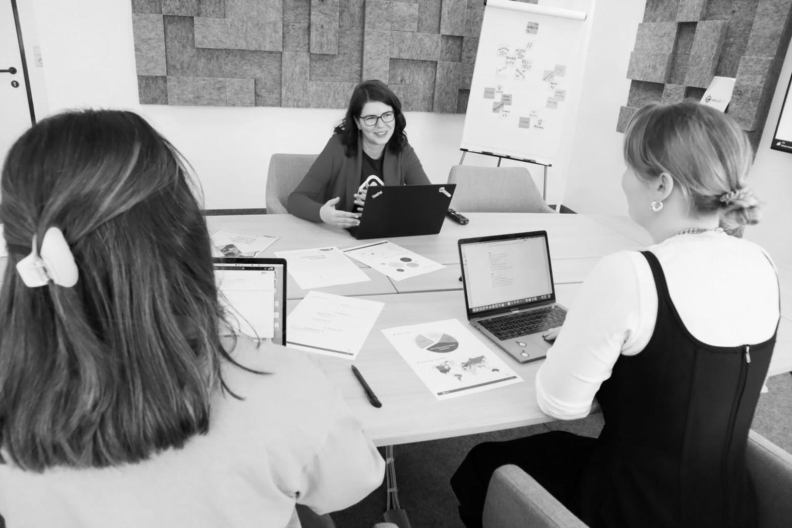Students engaged in collaborative financial planning workshop